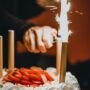person lighting the sparklers